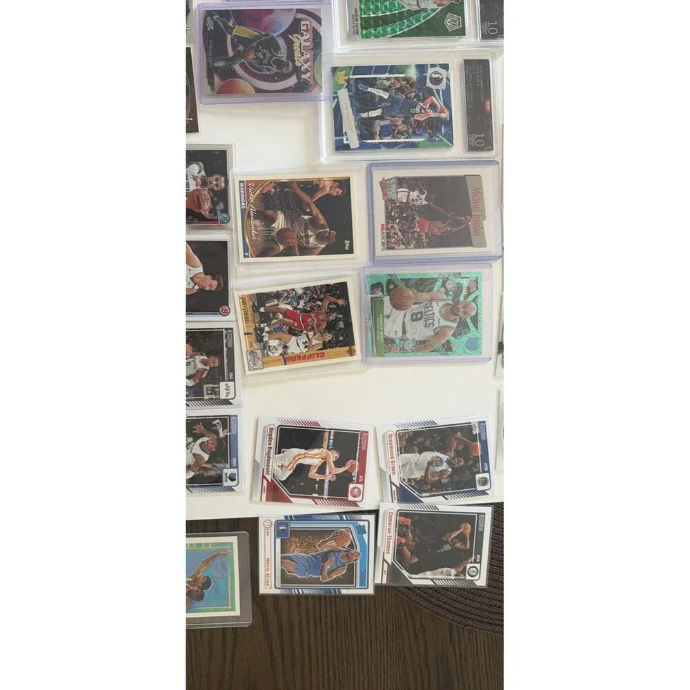 Panini 48-Card NBA 2023-24 Lot Hoops Rookies, MJ Bonus graded Luka and Tatum